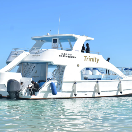 Catamaran sailing in turquoise waters, ideal for Punta Cana safety tips.